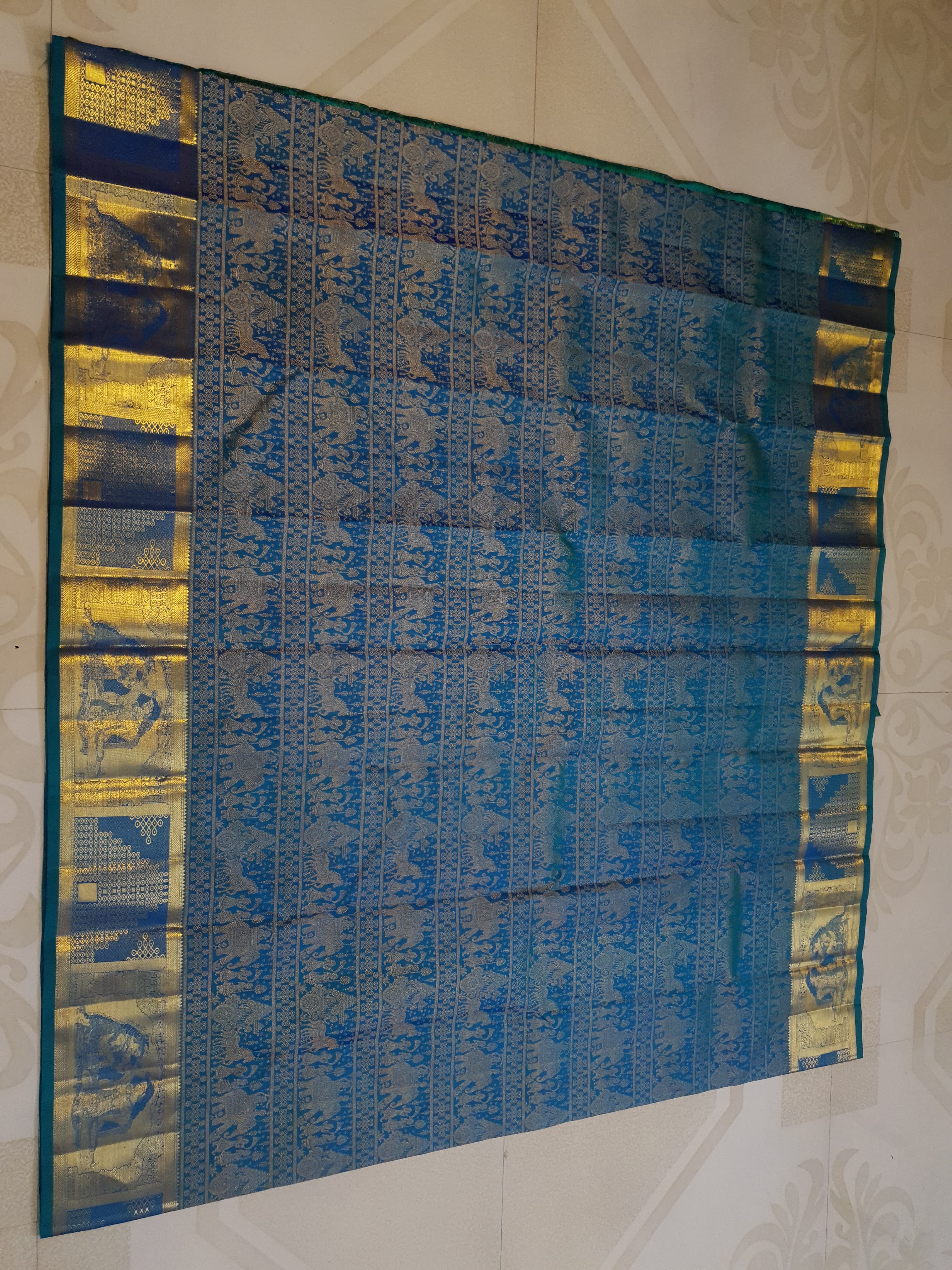Dual Tone Peacock Blue Kanchipuram Handloom 2G Gold pattu silk saree featuring intricate palaki (Kalyana Pallakku) traditional gold zari weaving.