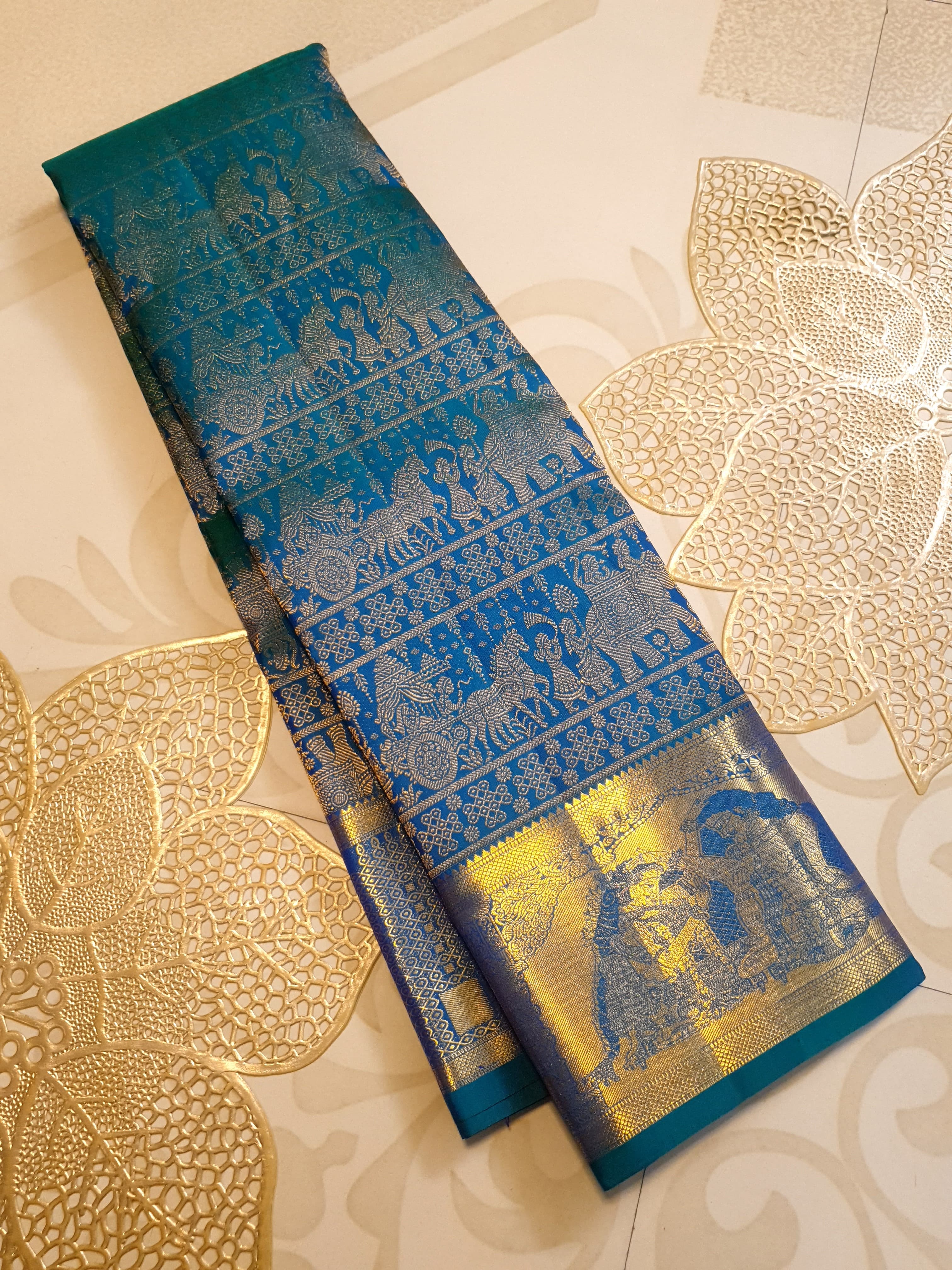 Dual Tone Peacock Blue Kanchipuram Handloom 2G Gold pattu silk saree featuring intricate palaki (Kalyana Pallakku) traditional gold zari weaving.
