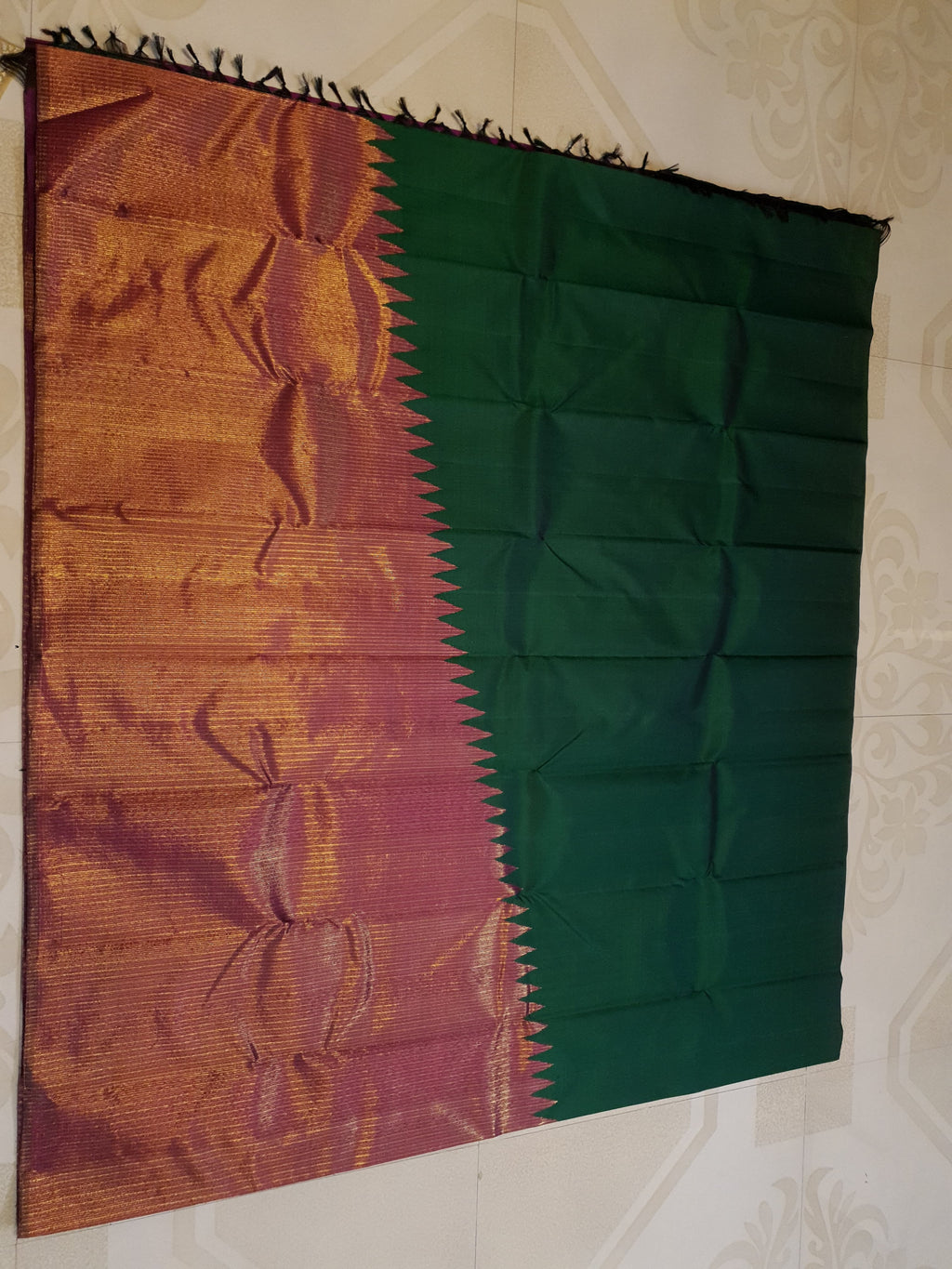 Bottle Green Kanchipuram handloom 2G gold temple silk saree featuring traditional gold zari weaving and classic temple borders.