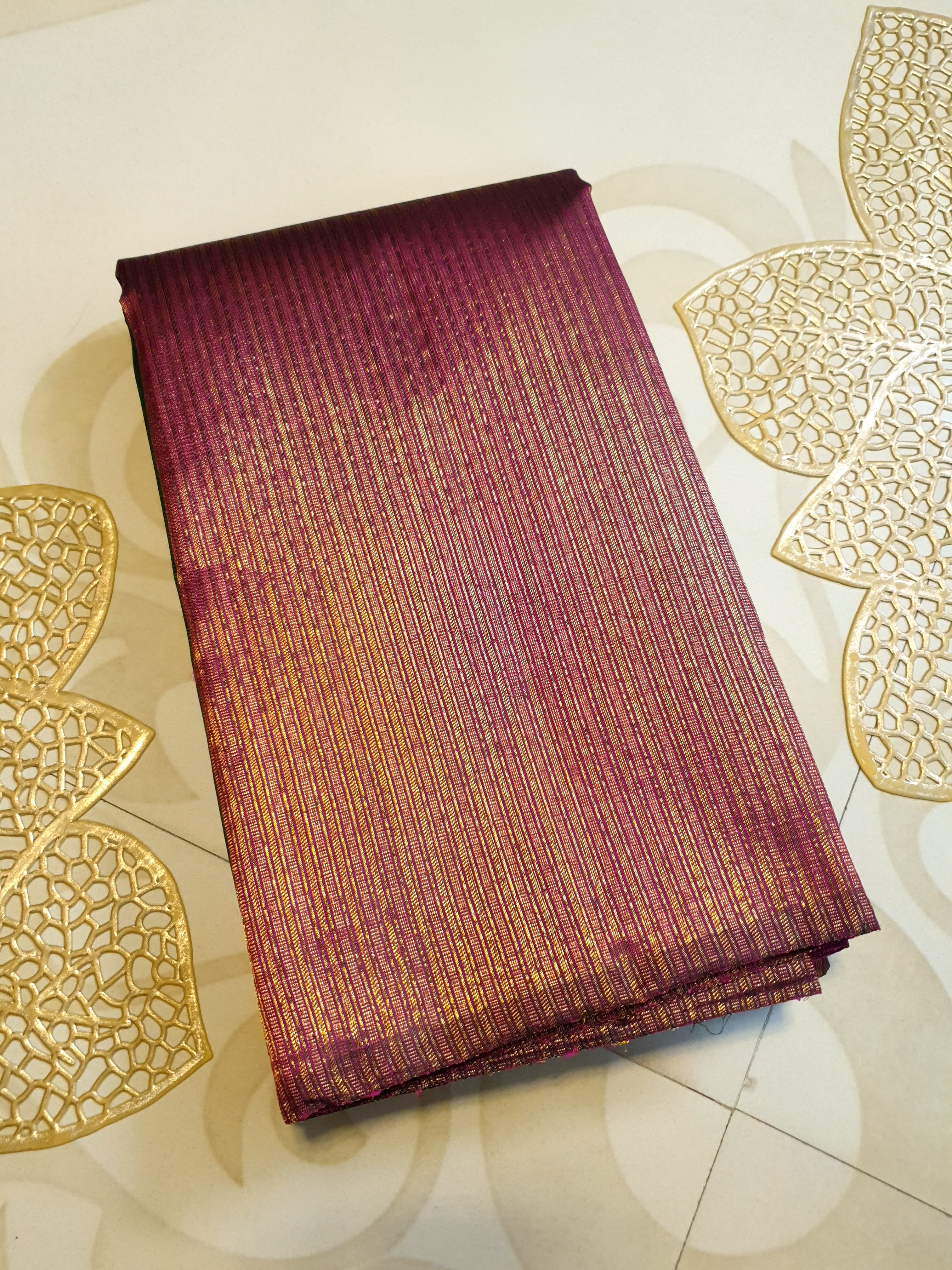 Bottle Green Kanchipuram handloom 2G gold temple silk saree featuring traditional gold zari weaving and classic temple borders.