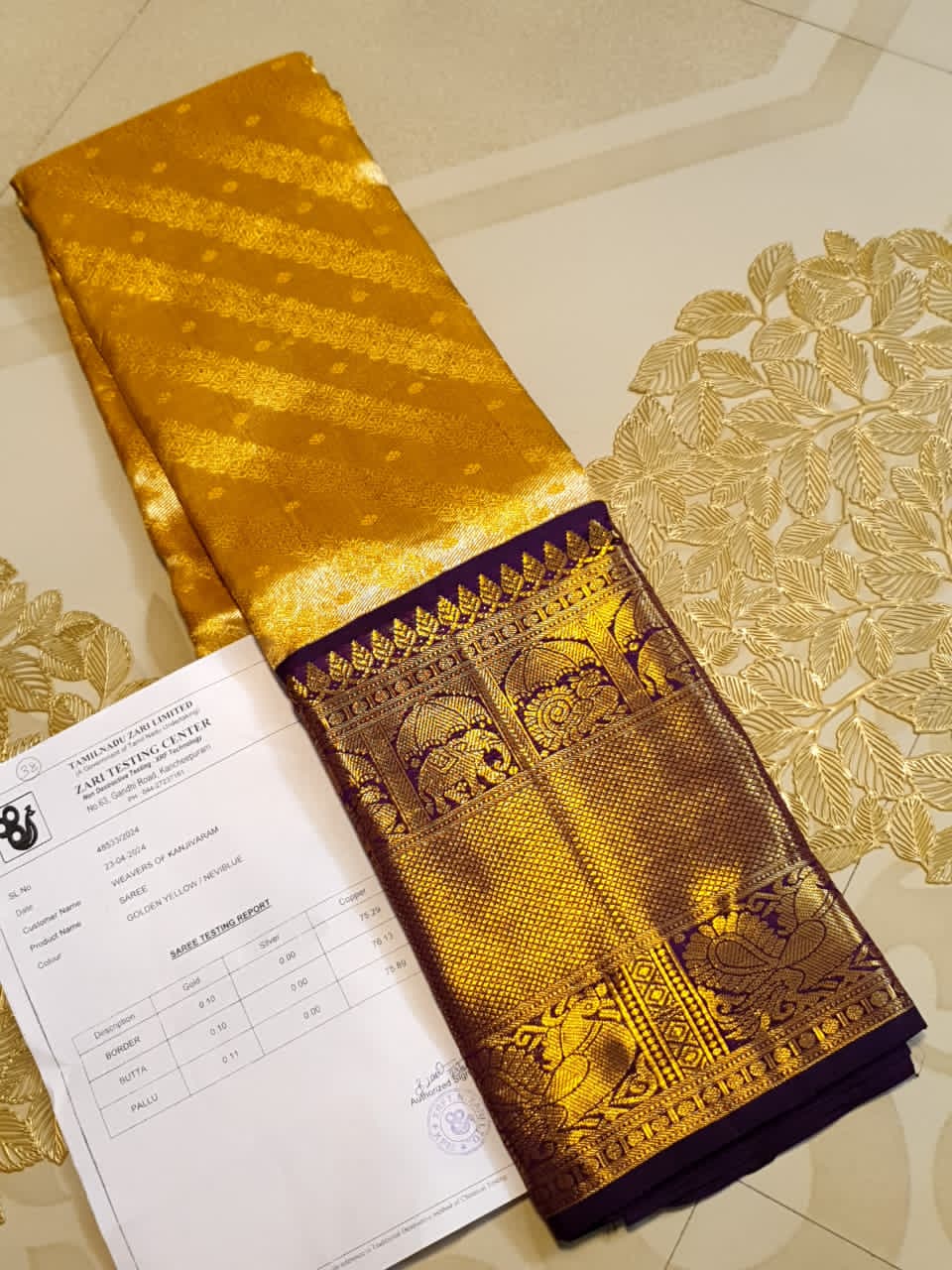 Luxurious Gold Kanchipuram Handloom 2G Gold Tissue Silk Saree with a rich purple and zari woven border and pallu