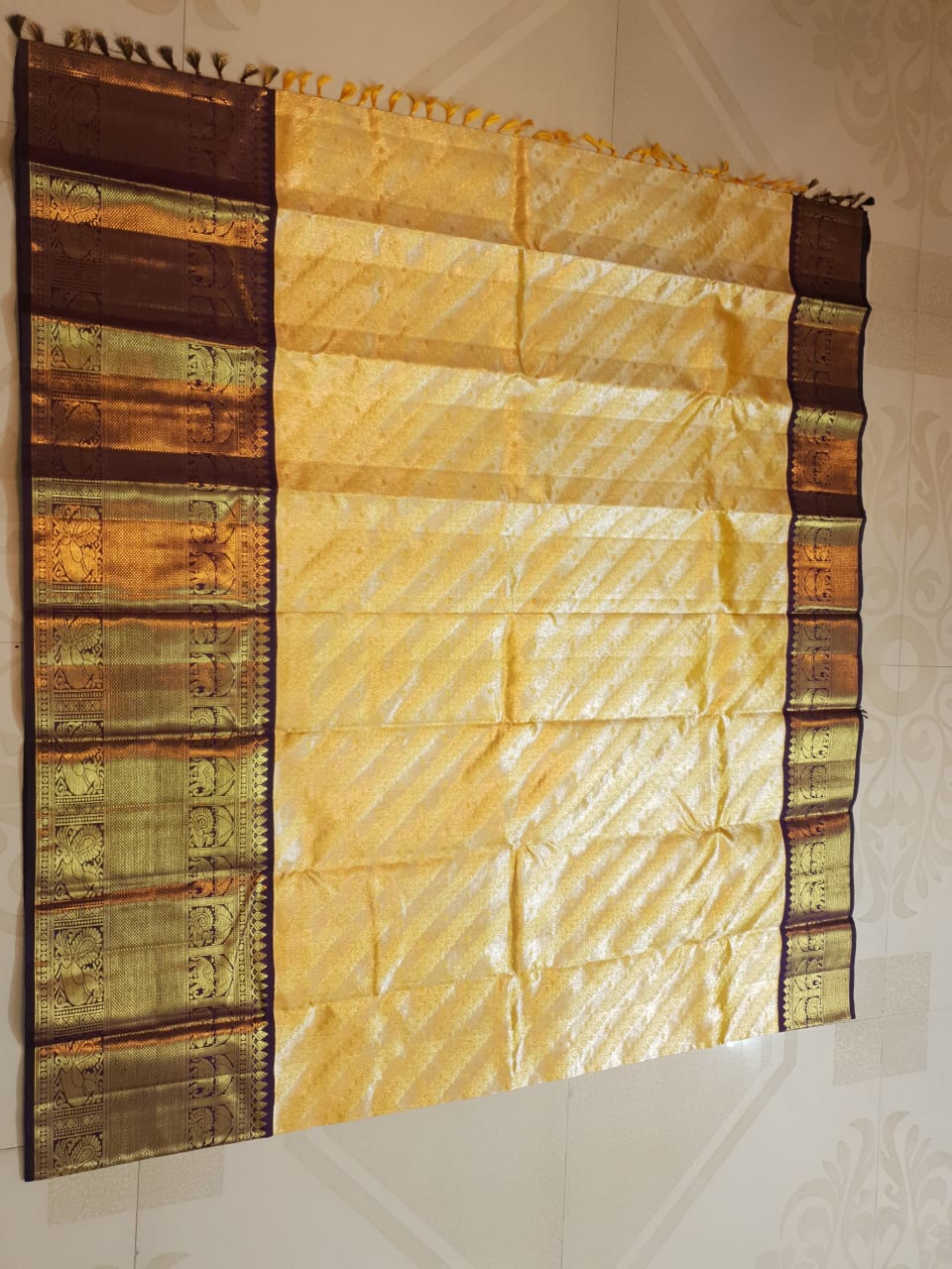 Luxurious Gold Kanchipuram Handloom 2G Gold Tissue Silk Saree with a rich purple and zari woven border and pallu