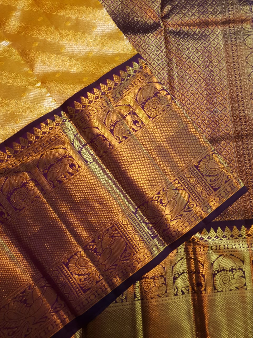 Luxurious Gold Kanchipuram Handloom 2G Gold Tissue Silk Saree with a rich purple and zari woven border and pallu