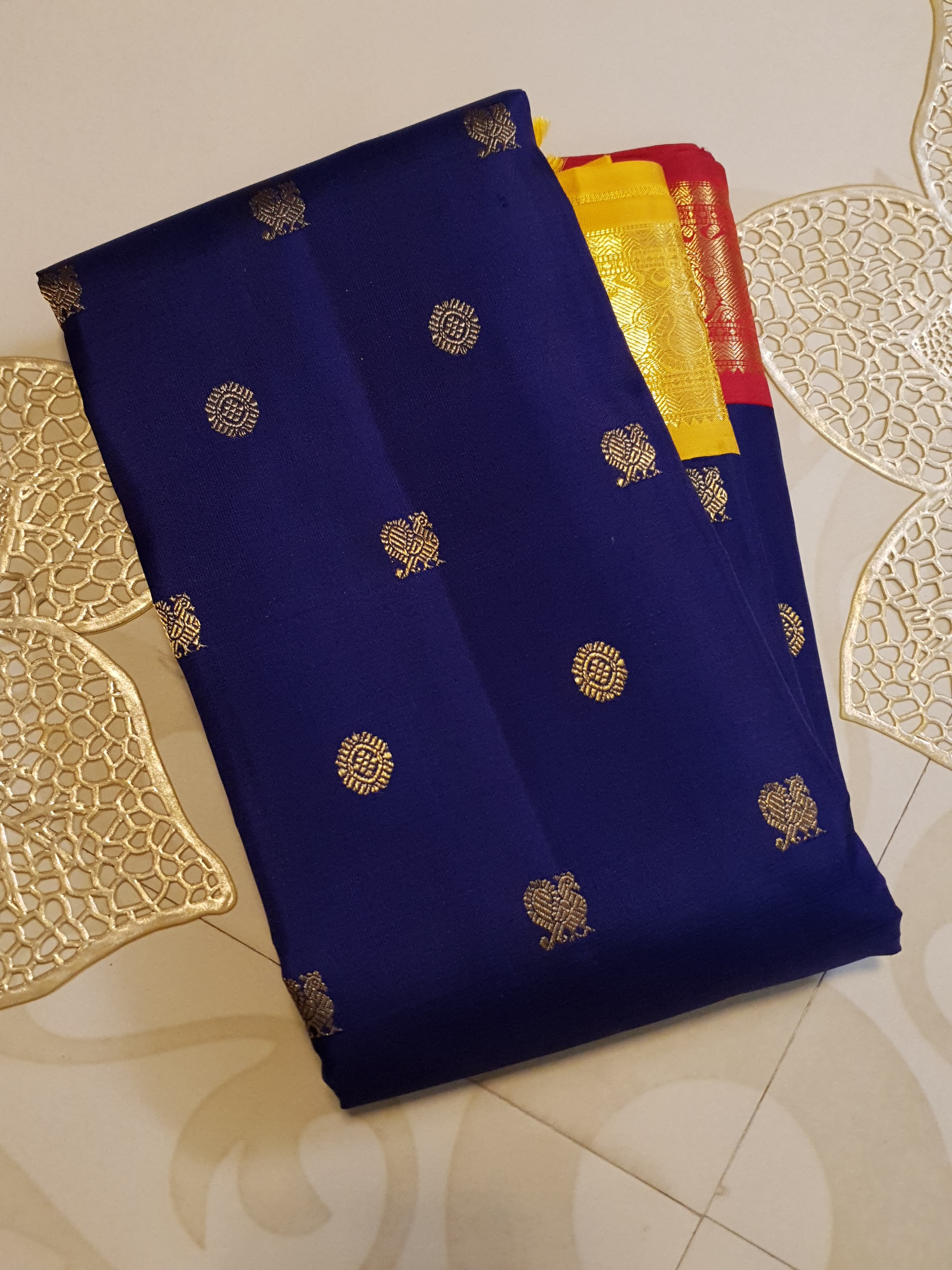Royal Blue Kanchipuram Handloom 3G Gold Korvai Silk Ganga Jamuna Saree with traditional buttas and dual-color borders.