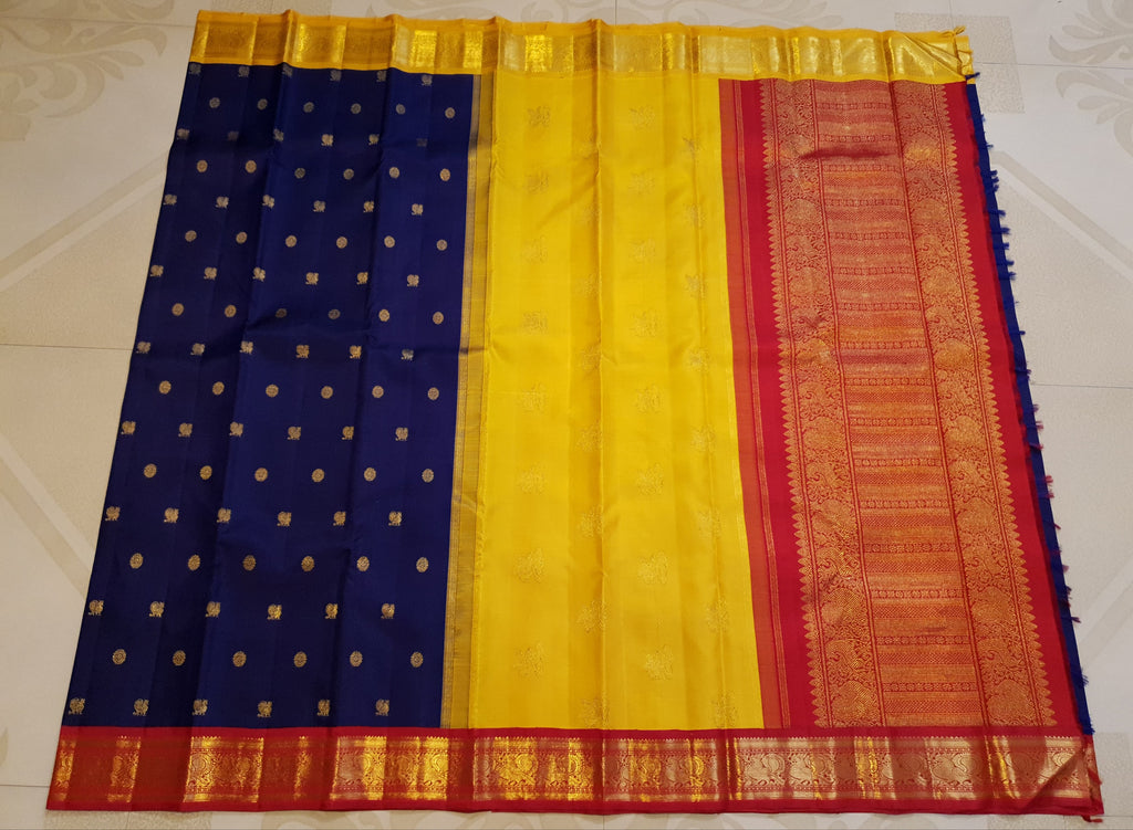 Royal Blue Kanchipuram Handloom 3G Gold Korvai Silk Ganga Jamuna Saree with traditional buttas and dual-color borders.