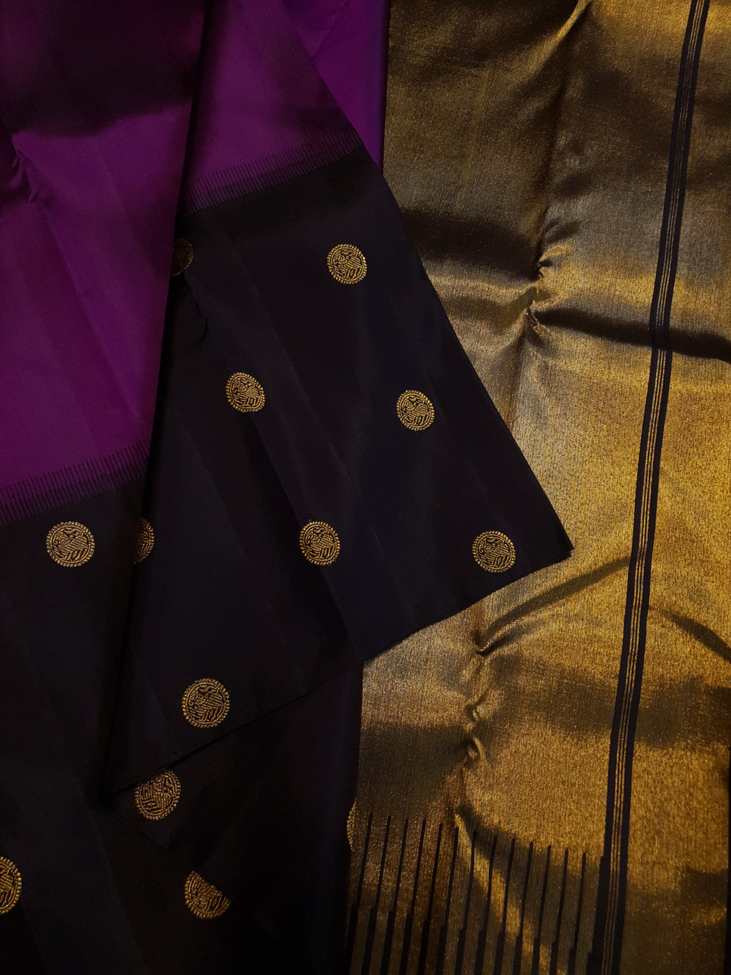Purple Kanchipuram handloom pure silk saree featuring 2G gold yazhi motifs and rich contrasting details.