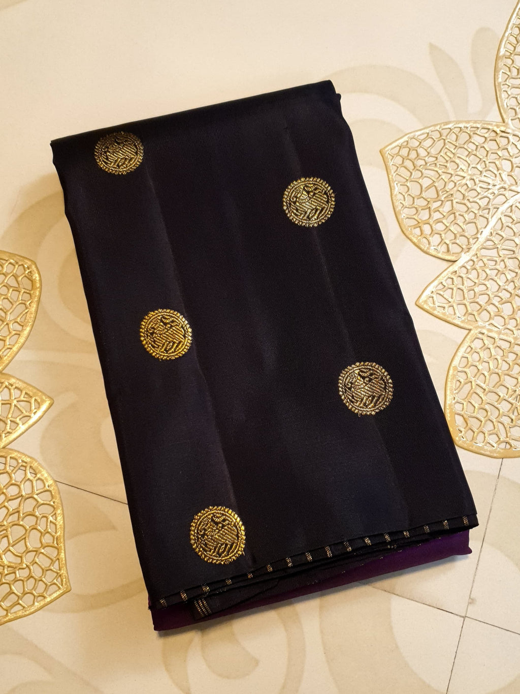 Purple Kanchipuram handloom pure silk saree featuring 2G gold yazhi motifs and rich contrasting details.