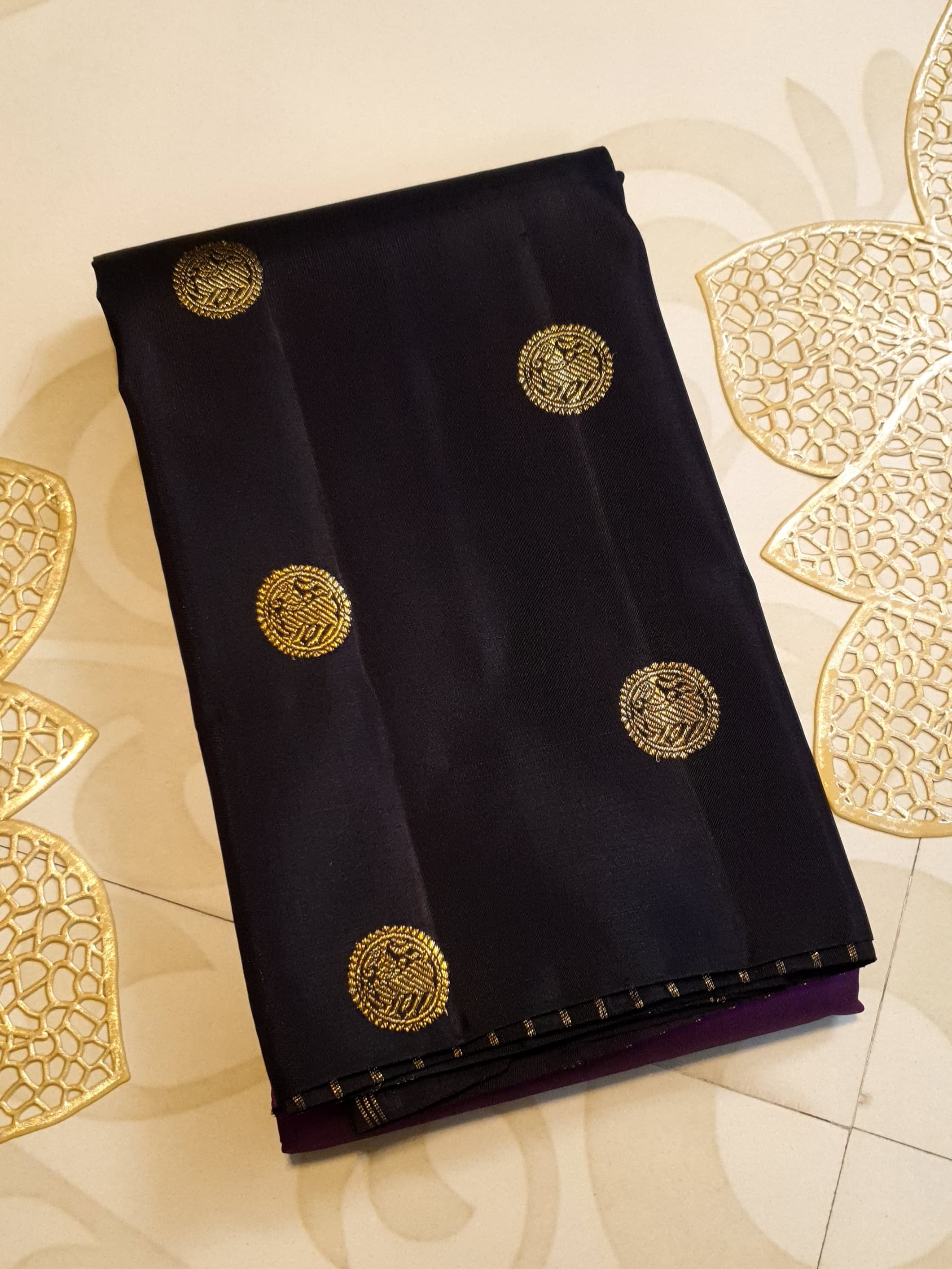Purple Kanchipuram handloom pure silk saree featuring 2G gold yazhi motifs and rich contrasting details.