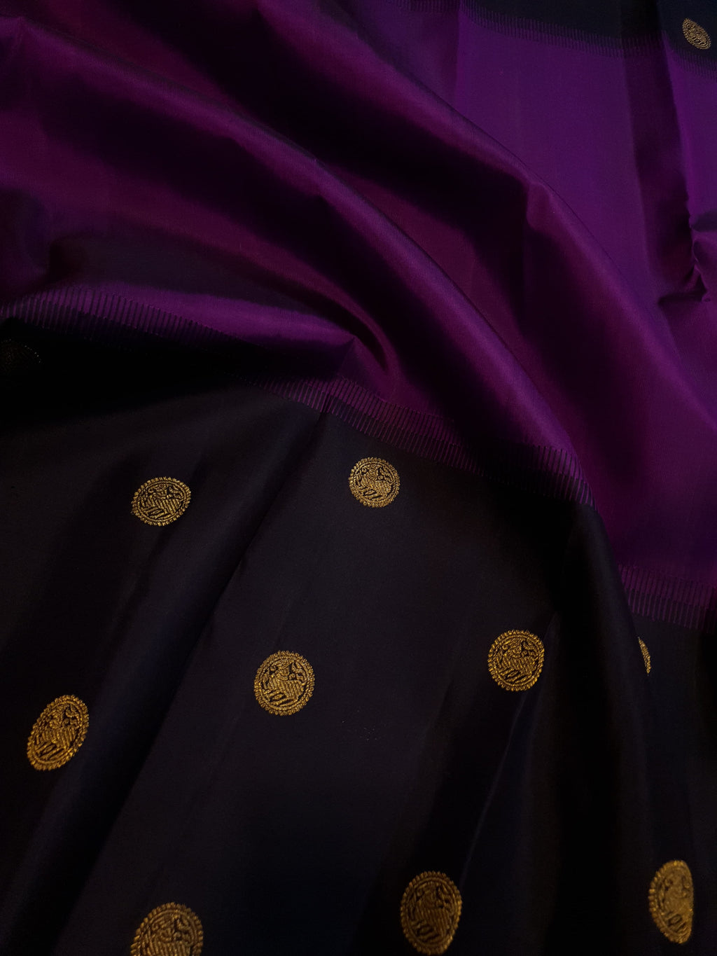 Purple Kanchipuram handloom pure silk saree featuring 2G gold yazhi motifs and rich contrasting details.