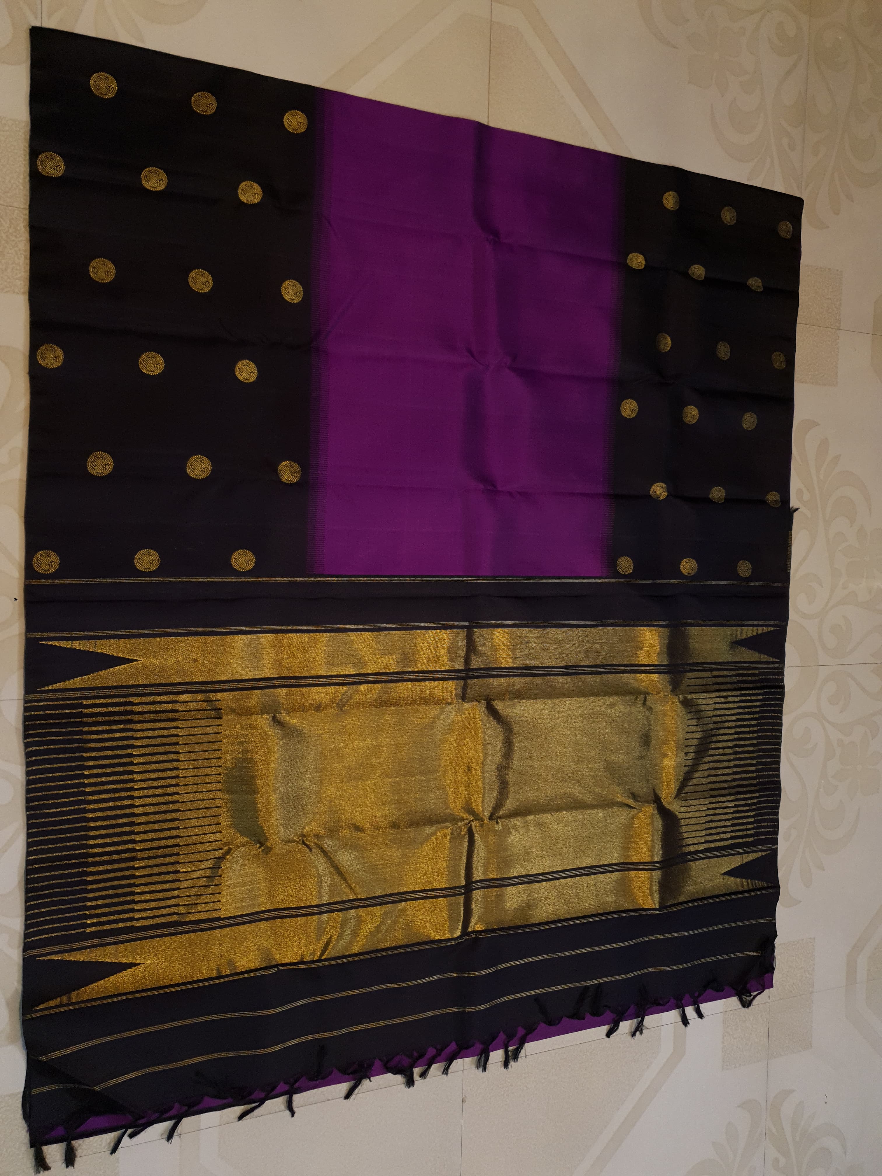 Purple Kanchipuram handloom pure silk saree featuring 2G gold yazhi motifs and rich contrasting details.