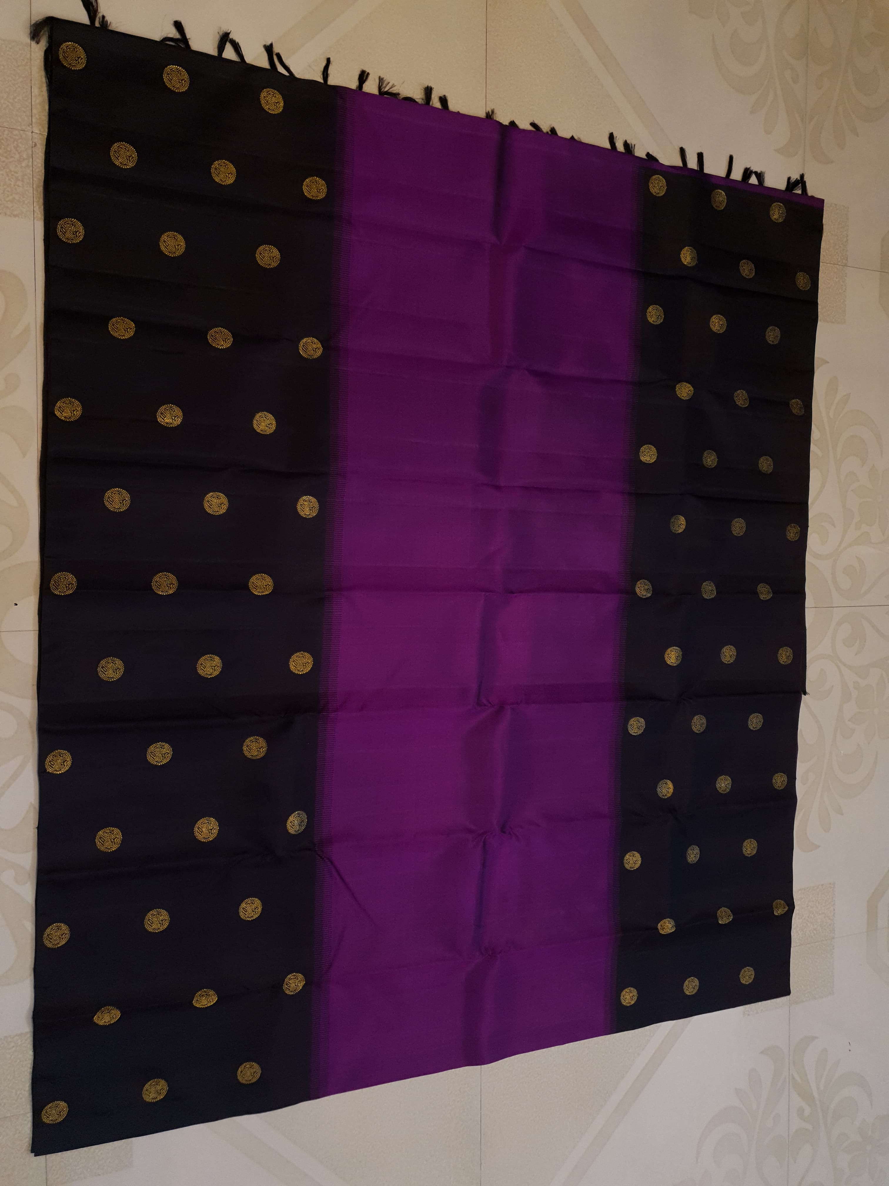 Purple Kanchipuram handloom pure silk saree featuring 2G gold yazhi motifs and rich contrasting details.