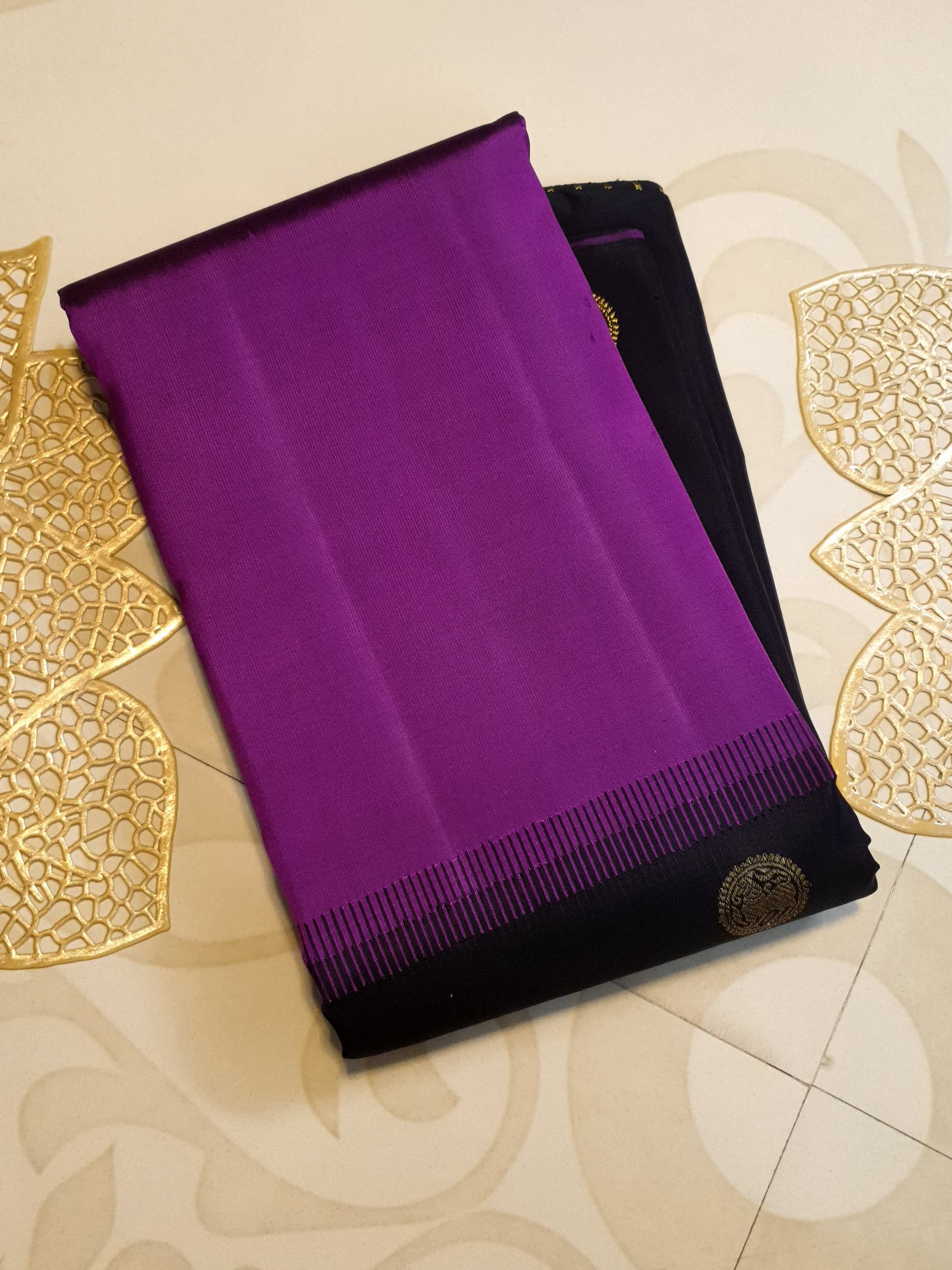 Purple Kanchipuram handloom pure silk saree featuring 2G gold yazhi motifs and rich contrasting details.