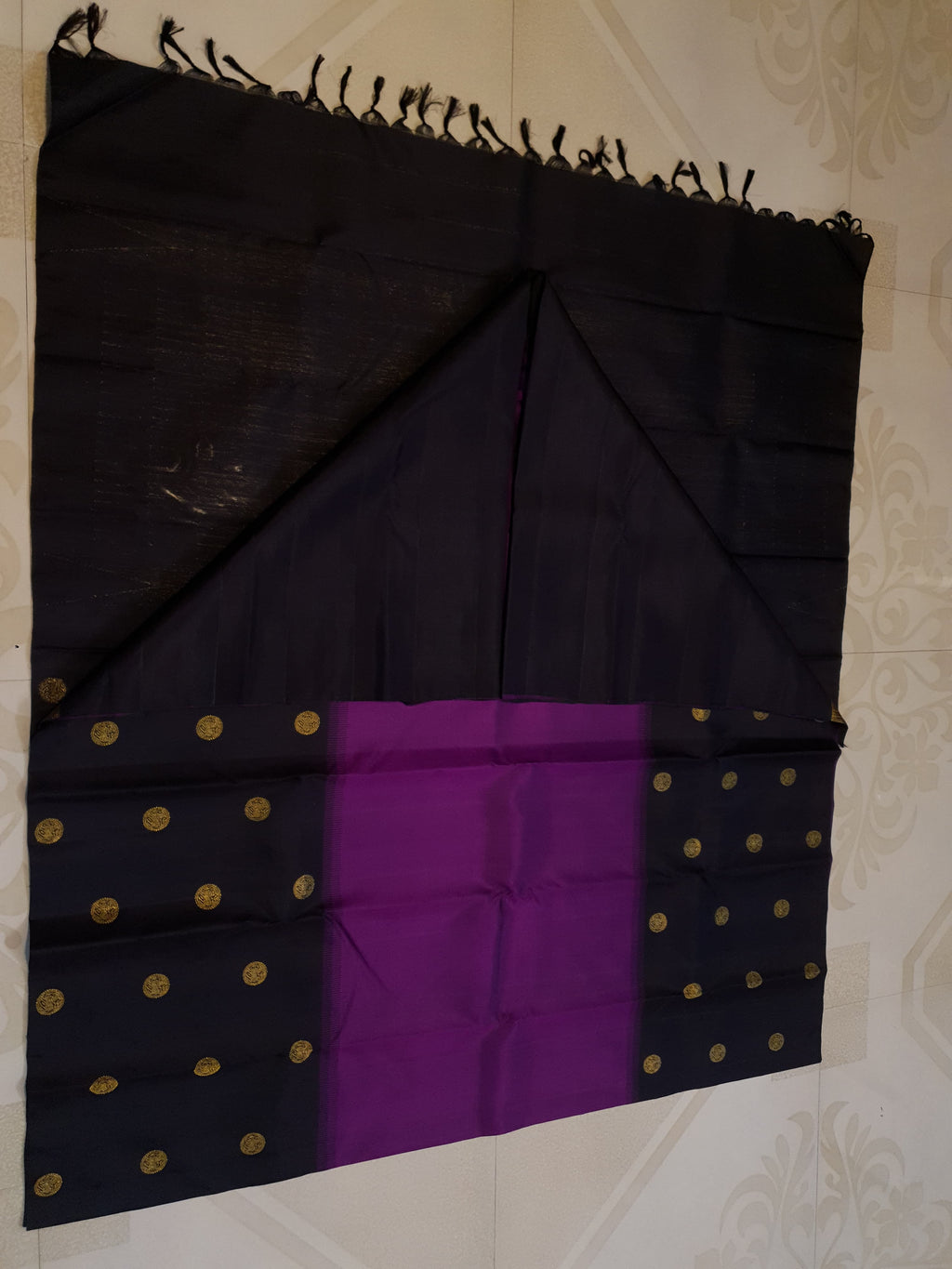 Purple Kanchipuram handloom pure silk saree featuring 2G gold yazhi motifs and rich contrasting details.