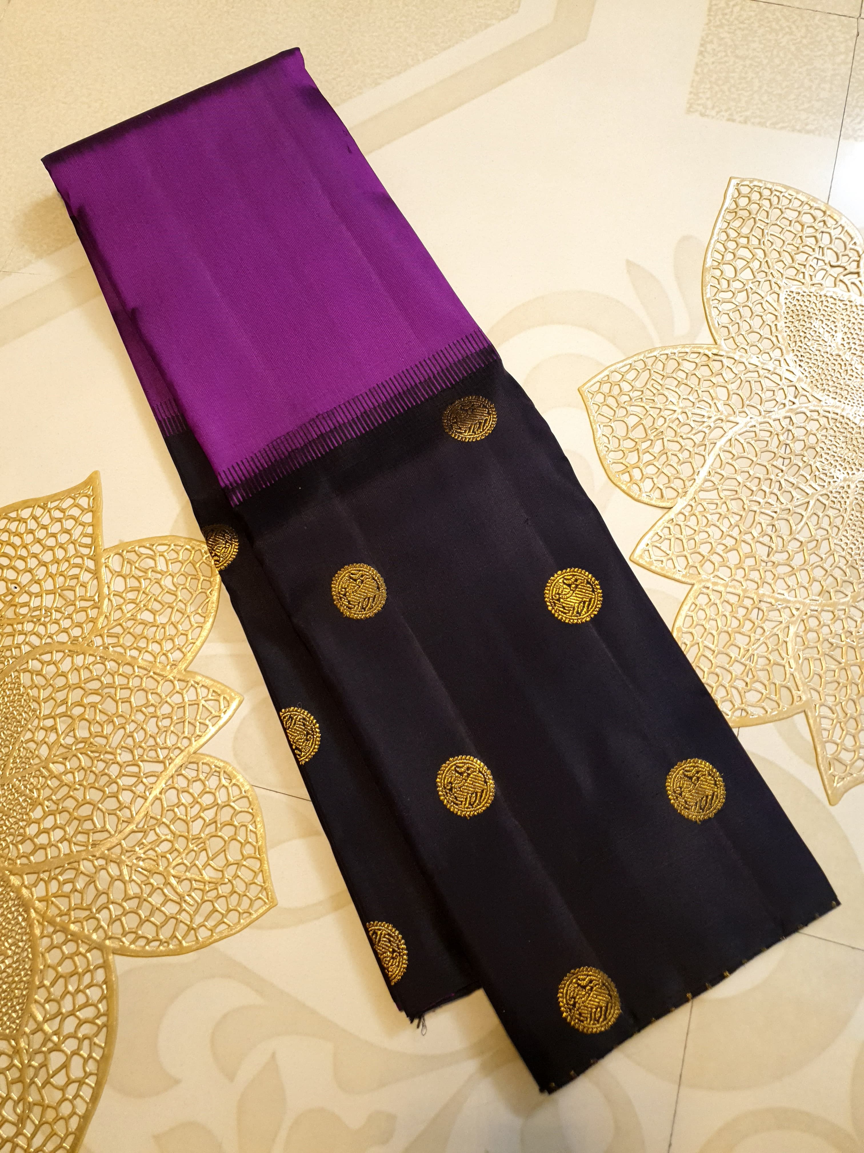 Purple Kanchipuram handloom pure silk saree featuring 2G gold yazhi motifs and rich contrasting details.