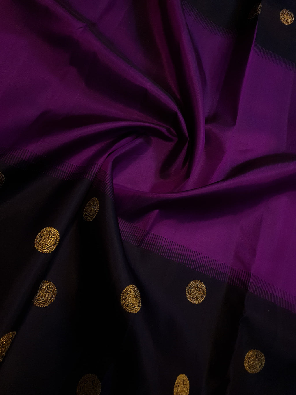Purple Kanchipuram handloom pure silk saree featuring 2G gold yazhi motifs and rich contrasting details.