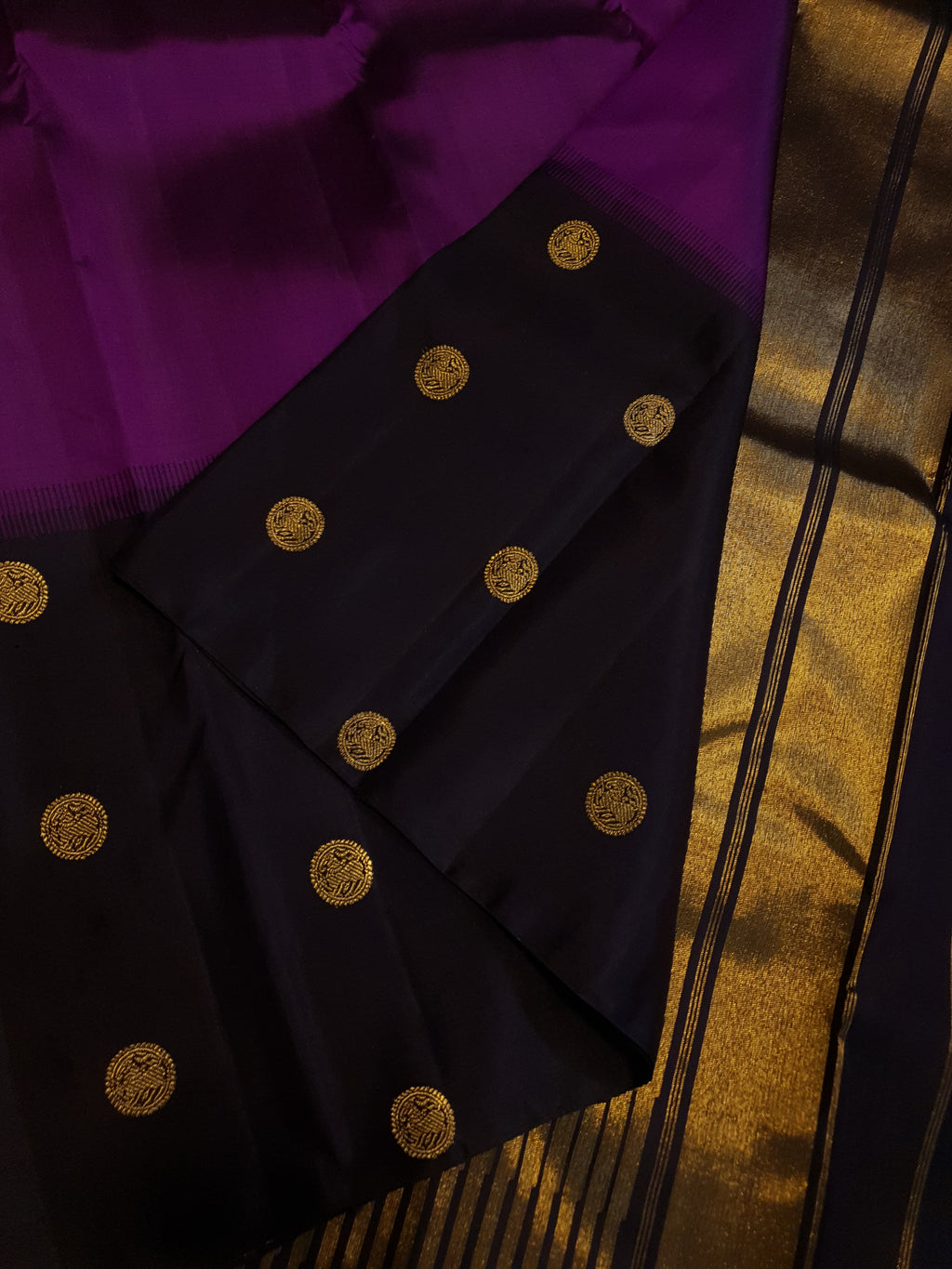 Purple Kanchipuram handloom pure silk saree featuring 2G gold yazhi motifs and rich contrasting details.