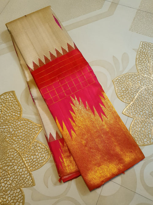Elegant Beige handloom Kanchipuram 2G gold korvai silk saree featuring a magenta pink temple border and rich gold zari pallu.