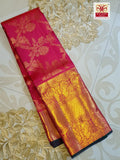 Red and gold Kanchipuram silk saree with intricate zari floral patterns