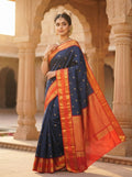 Midnight Blue Kanchipuram Handloom 2G Gold Korvai Silk Saree with contrasting orange gap borders and traditional motifs.