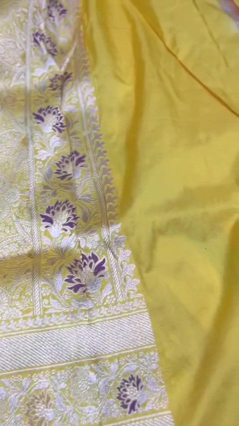Lime Yellow Banarasi Handloom Katan Silk Saree with a detailed checkered body and purple Meenakari floral motifs