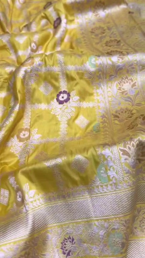 Lime Yellow Banarasi Handloom Katan Silk Saree with a detailed checkered body and purple Meenakari floral motifs