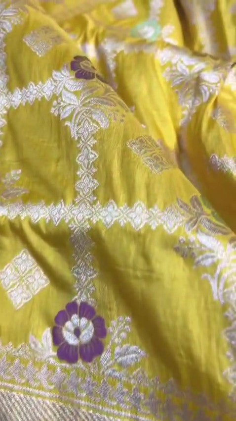 Lime Yellow Banarasi Handloom Katan Silk Saree with a detailed checkered body and purple Meenakari floral motifs