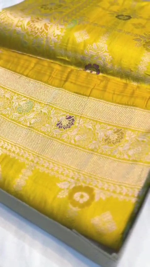 Lime Yellow Banarasi Handloom Katan Silk Saree with a detailed checkered body and purple Meenakari floral motifs