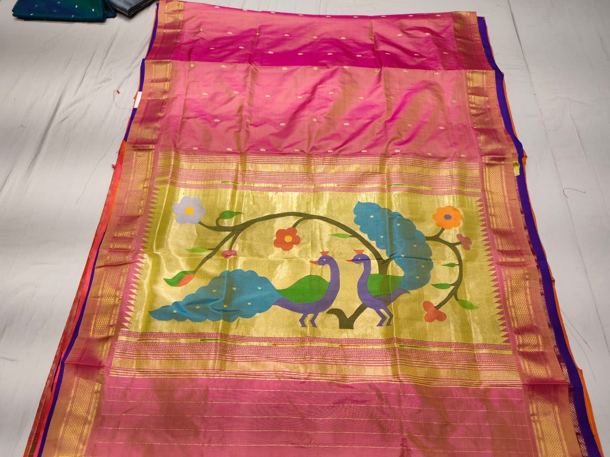 Dual-Tone Peach-Pink Paithani Handloom Pure Silk Saree with self zari buttas on an iridescent body and a golden tissue zari pallu featuring colorful peacock motifs.
