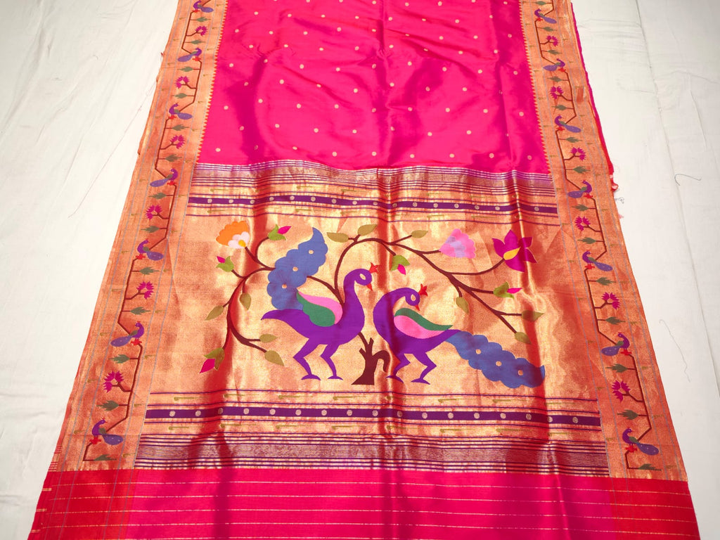 Dark Pink Paithani Handloom Pure Silk Saree with delicate self-woven zari buttas on the body and a tissue zari pallu featuring a pair of colorful peacocks perched on flowering branches.