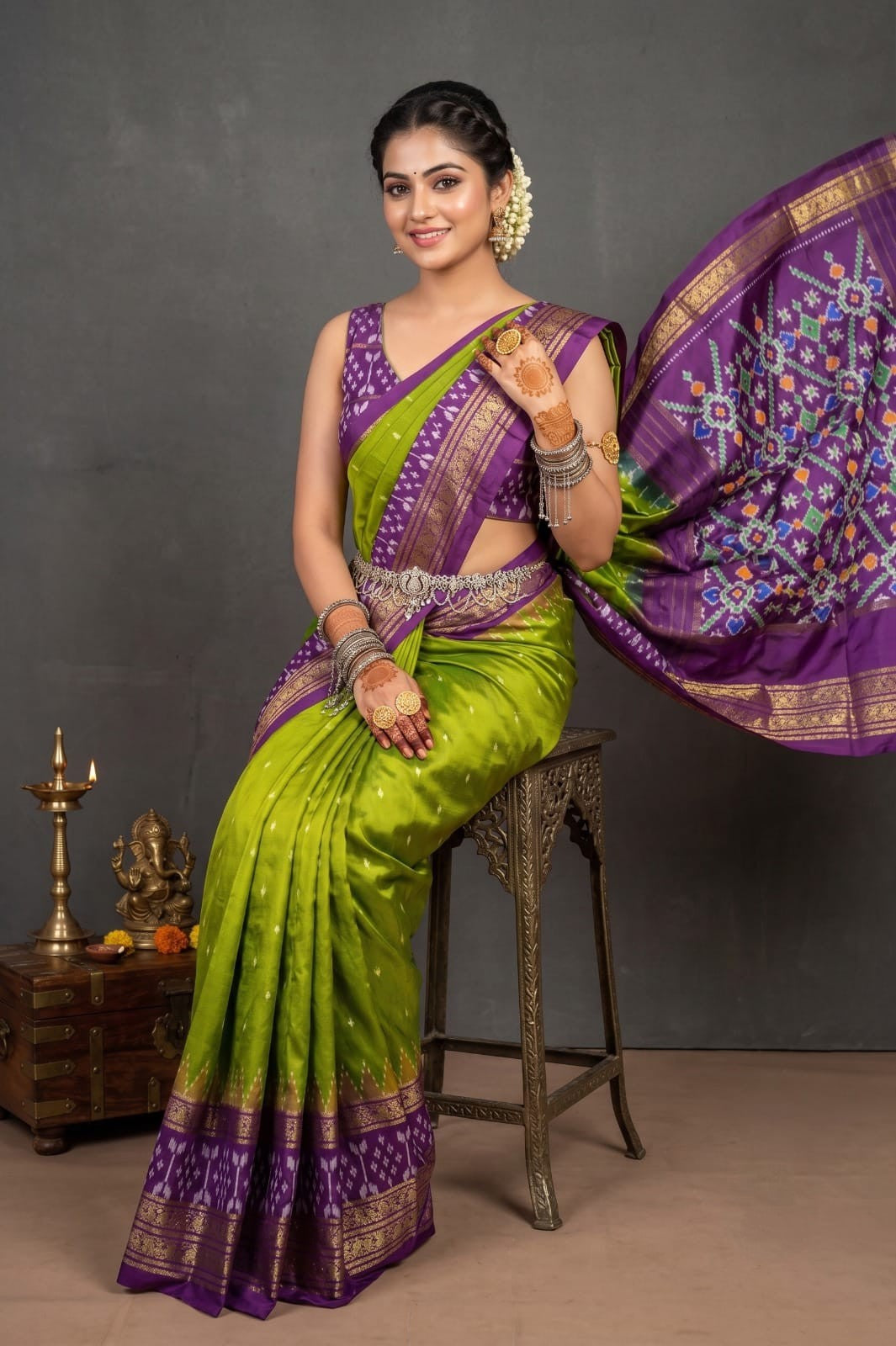 Pochampally Handloom Ikat Madthasu Patola Silk Saree in rich weave with intricate all-over zari buttas