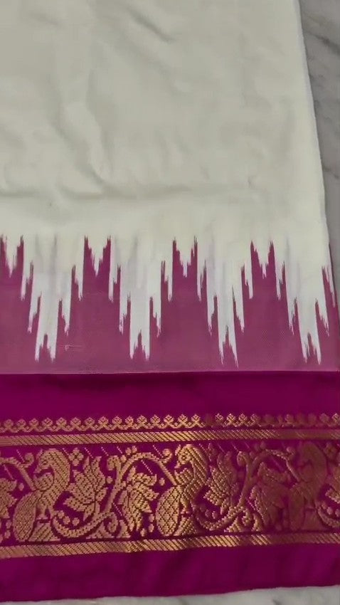 Cream Pochampally Handloom Pure Ikkat Silk Saree featuring yellow and pink Ganga Yamuna temple design borders.