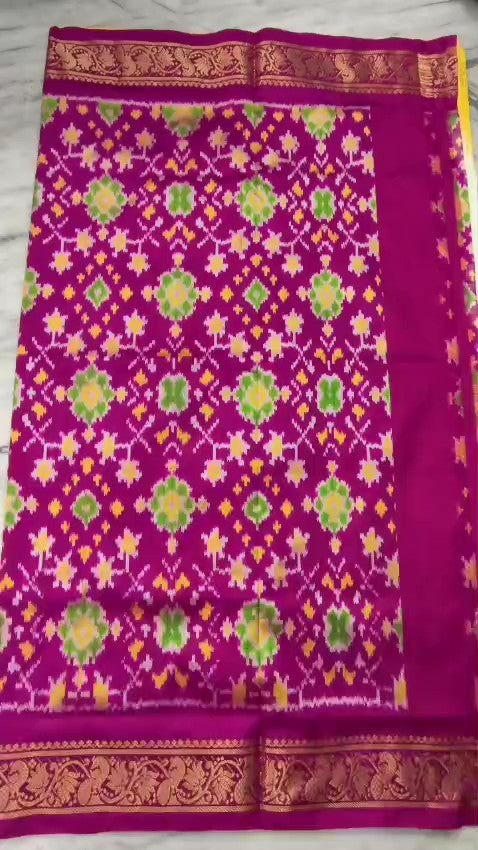 Cream Pochampally Handloom Pure Ikkat Silk Saree featuring yellow and pink Ganga Yamuna temple design borders.