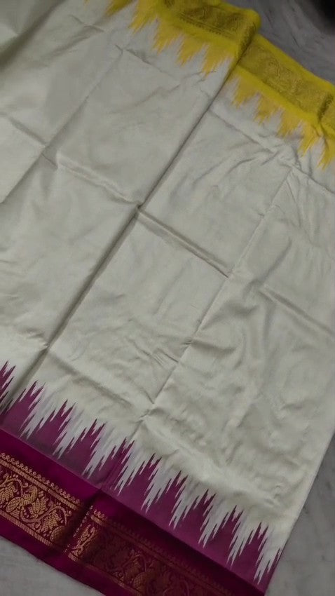 Cream Pochampally Handloom Pure Ikkat Silk Saree featuring yellow and pink Ganga Yamuna temple design borders.