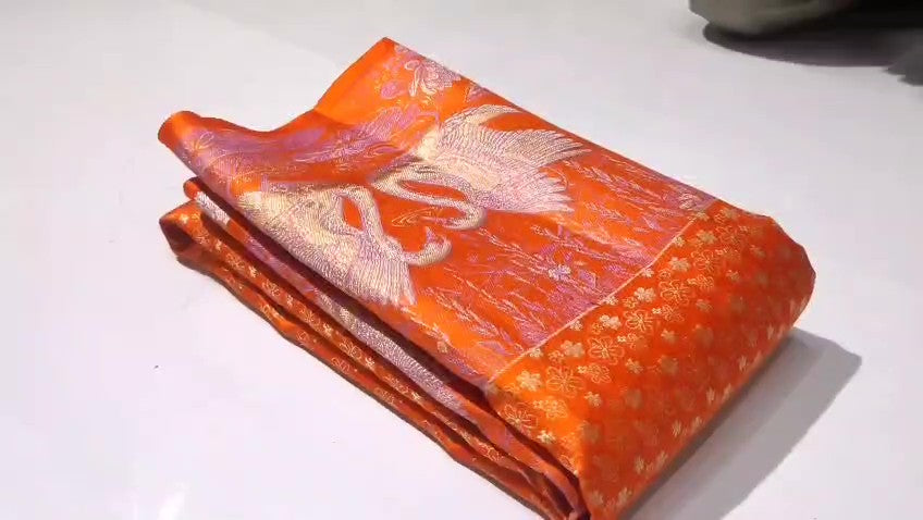Orange Kanchipuram Handloom Pattu Silk Bridal Saree with swan motifs