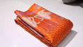 Orange Kanchipuram Handloom Pattu Silk Bridal Saree with swan motifs