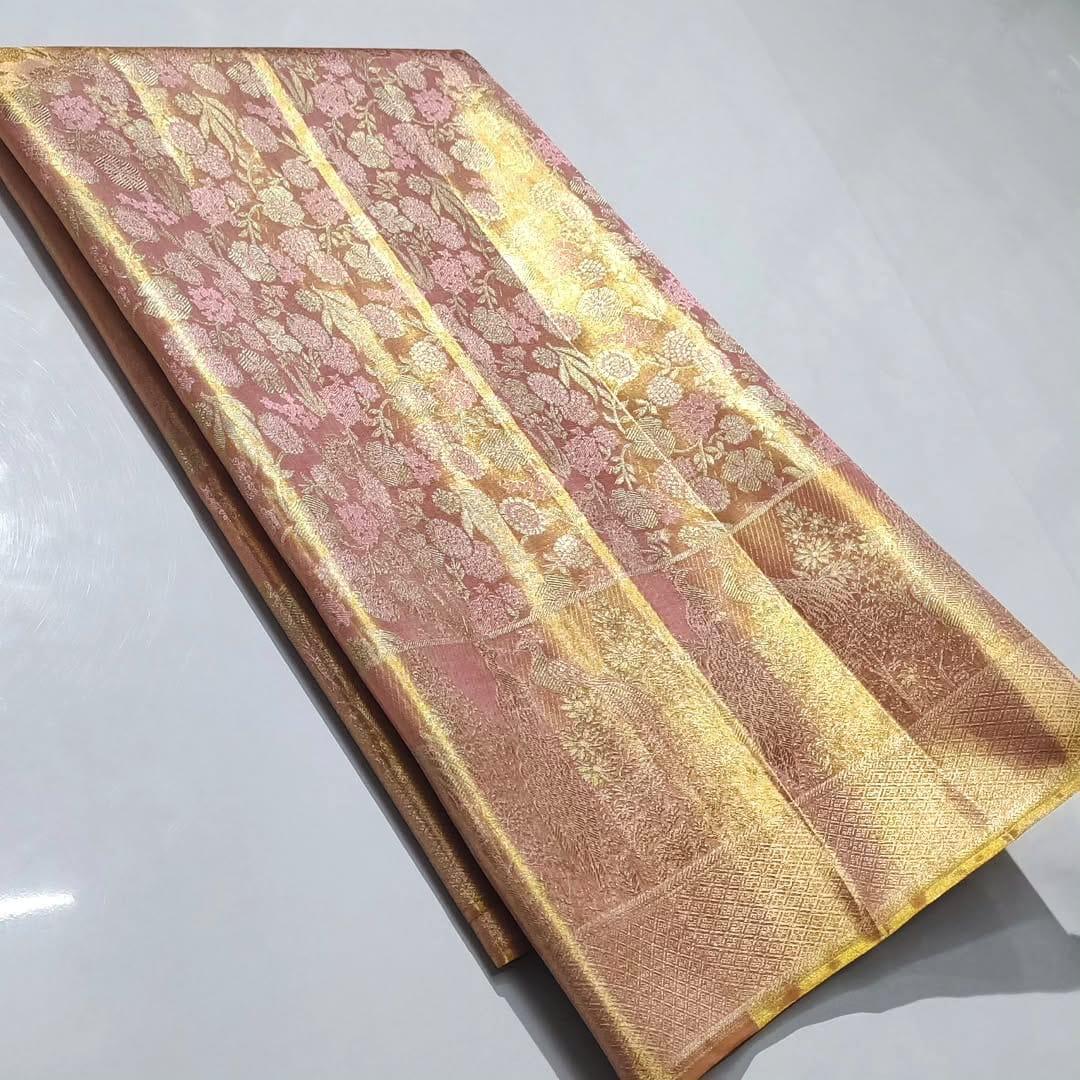 Dual-tone peach Kanchipuram handloom tissue brocade silk saree with intricate gold zari detailing, perfect for elegant wedding and festive looks.