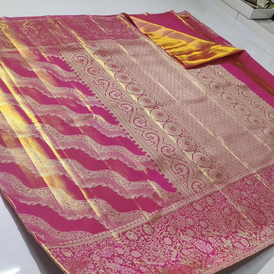 Shop our authentic Hot Pink Kanchipuram Handloom Tissue Brocade Silk Saree. Featuring intricate Meenakari work and Silk Mark certification for guaranteed purity.