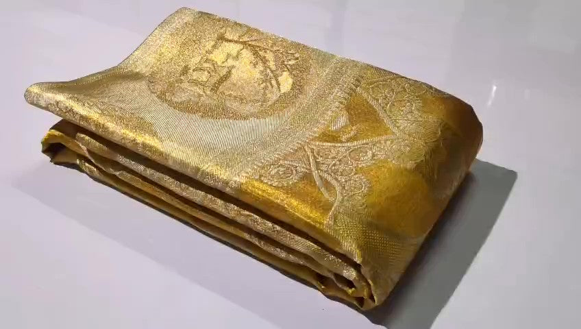 Gold Kanchipuram handloom tissue brocade silk bridal saree with all-over Meenakari work and deer design borders.