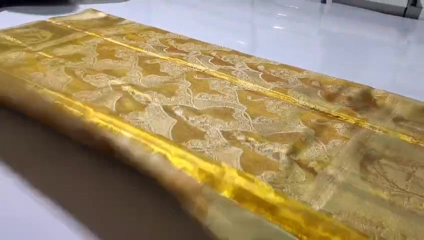 Gold Kanchipuram handloom tissue brocade silk bridal saree with all-over Meenakari work and deer design borders.