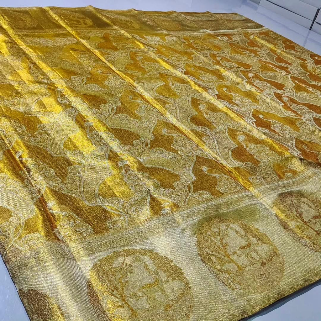Gold Kanchipuram handloom tissue brocade silk bridal saree with all-over Meenakari work and deer design borders.