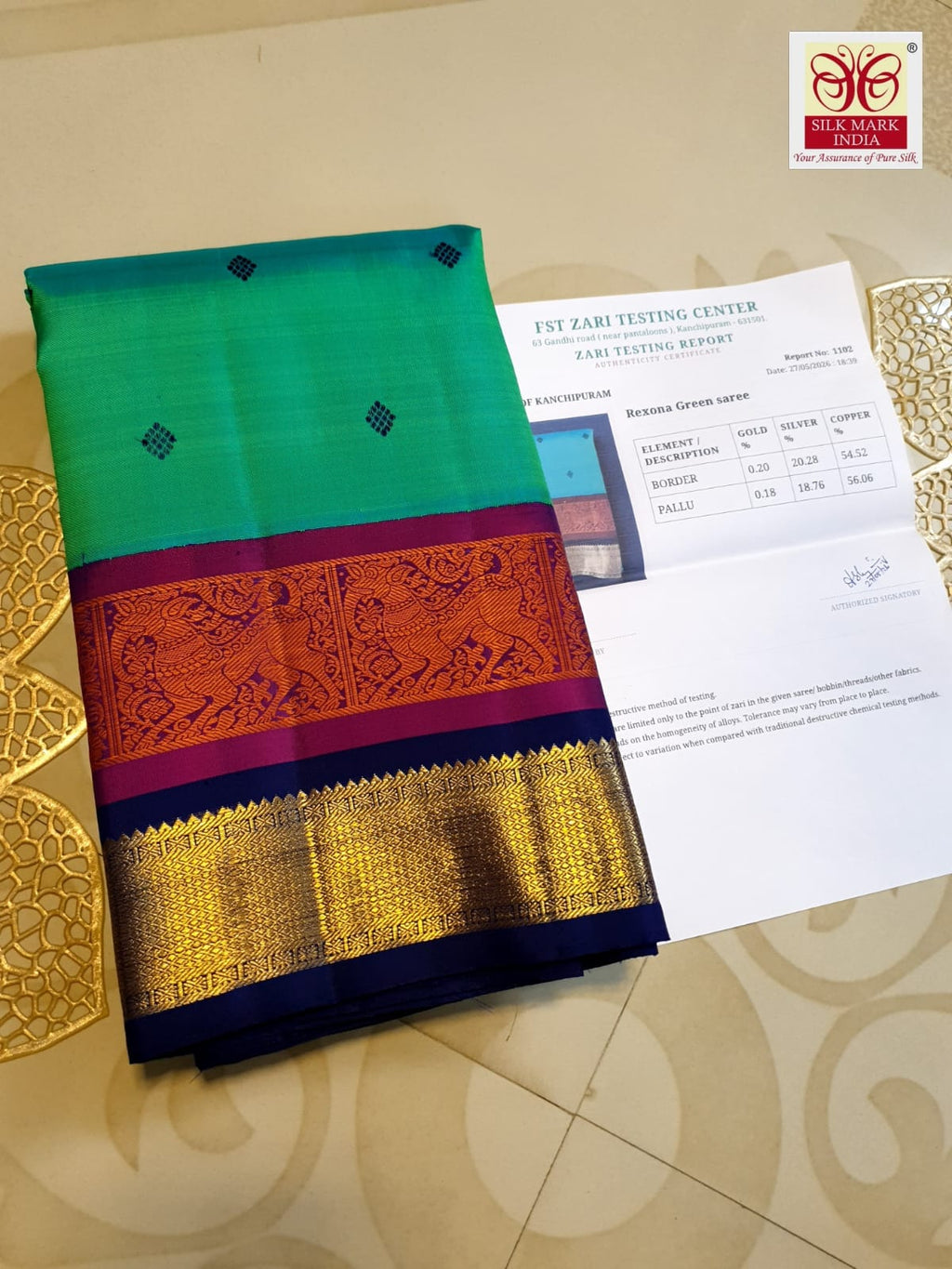 A radiant rexona green Kanchipuram handloom 3G gold vintage korvai silk saree showcasing two-tone contrast borders and intricate motifs.