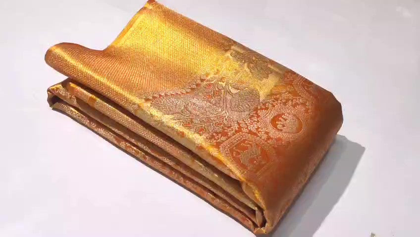 Elegant orange Kanchipuram handloom tissue brocade silk bridal saree with intricate meena detailing