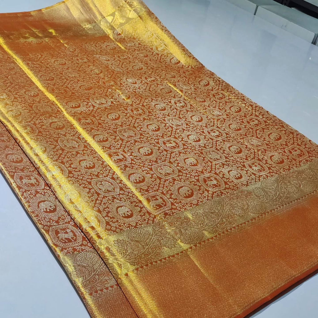 Elegant orange Kanchipuram handloom tissue brocade silk bridal saree with intricate meena detailing