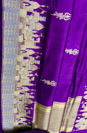 Royal purple Katan silk saree featuring gold zari Damru and Trishul motifs on the body and an intricate Kashi Ghat temple border.