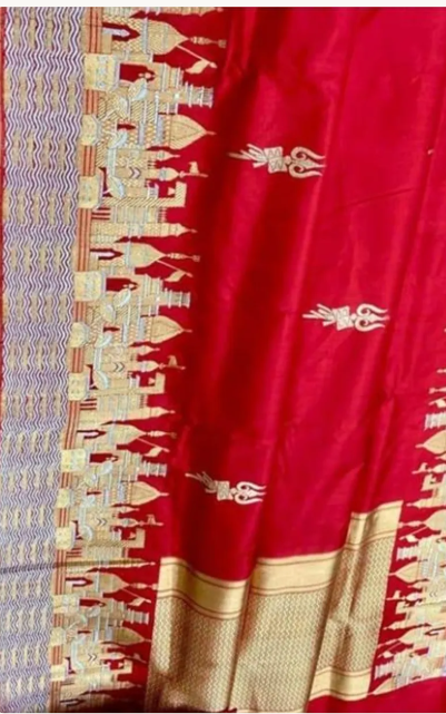 Exquisite Rustic Red Banarasi Katan Silk Saree featuring the legendary Kashi Ghat Meenakari design. Silk Mark Certified for 100% purity. A masterpiece of handloom storytelling.