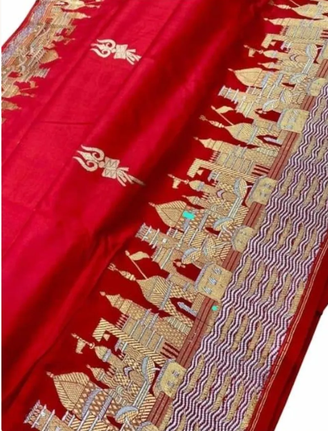 Exquisite Rustic Red Banarasi Katan Silk Saree featuring the legendary Kashi Ghat Meenakari design. Silk Mark Certified for 100% purity. A masterpiece of handloom storytelling.