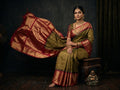 Silk Tatva Gadwal semi pattu silk saree featuring intricate all-over checks, traditional gold butta motifs, and a rich contrast border and pallu.