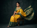 Silk Tatva Gadwal semi pattu silk saree featuring intricate all-over checks, traditional gold butta motifs, and a rich contrast border and pallu.