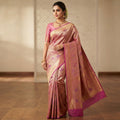 Exquisite pink Kanchipuram handloom tissue brocade Meenakari silk saree with intricate zari work and traditional motifs