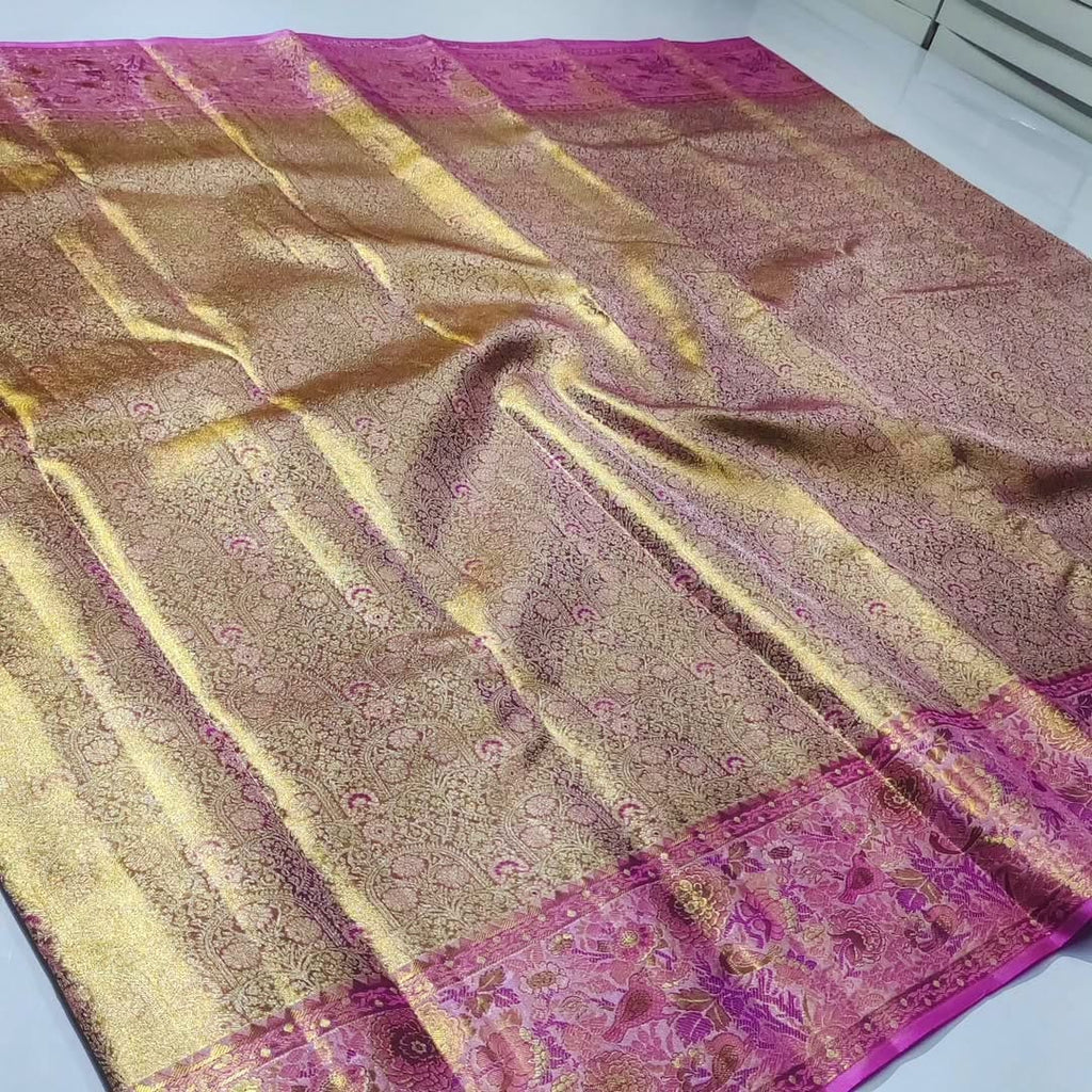 Exquisite pink Kanchipuram handloom tissue brocade Meenakari silk saree with intricate zari work and traditional motifs